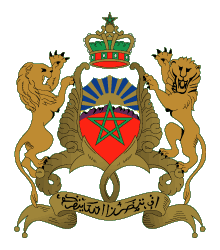 De gueules à une divise voûté abaissée coupée fuselée de sinople et d'or en chef et de sinople et d'argent en 
pointe, accompagné en chef d'un soleil issant d'or à quinze rais enveloppés d'azur, à un pentacle de sinople posé en pointe